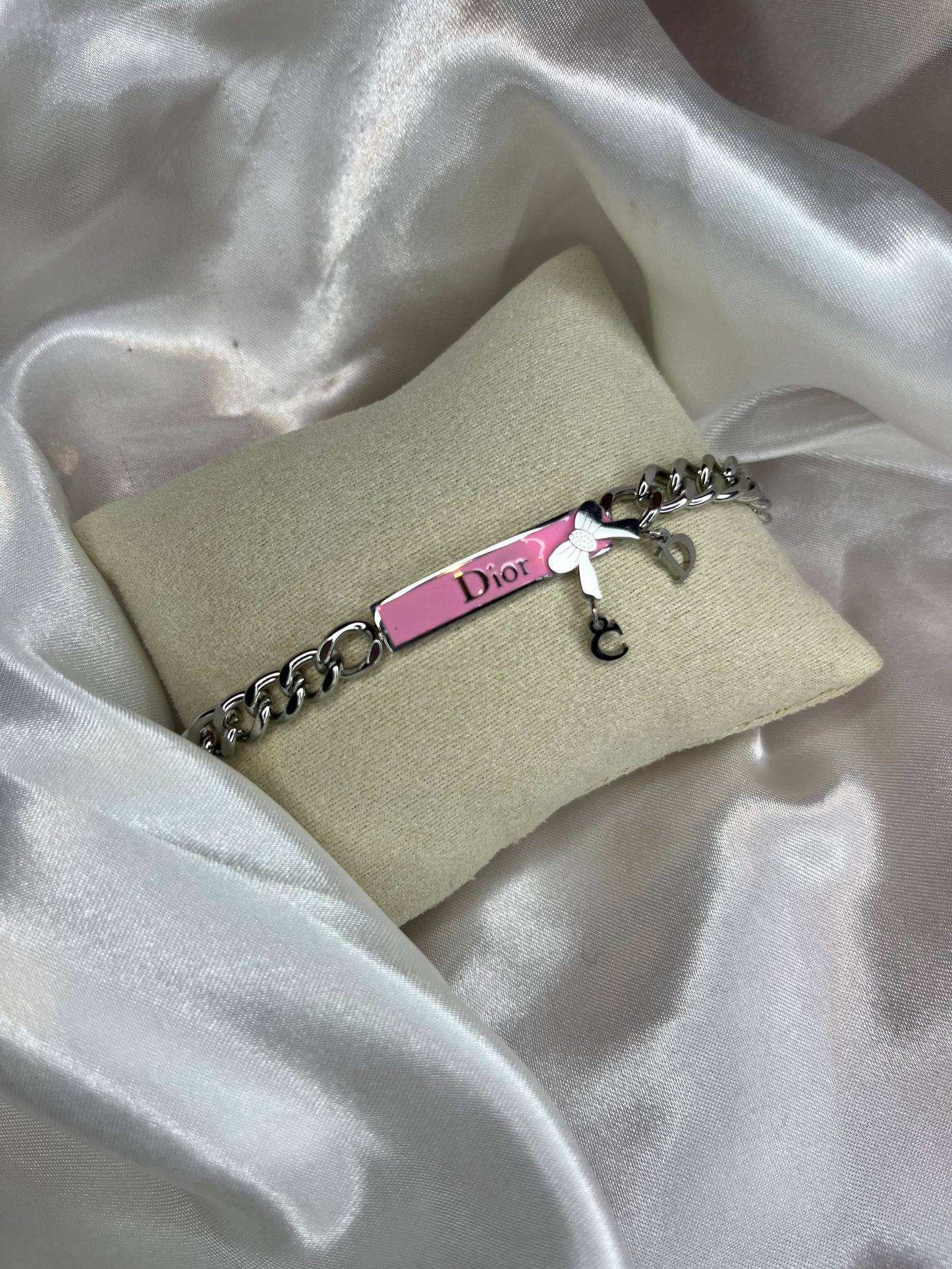Silver chain pink bow DD bracelet