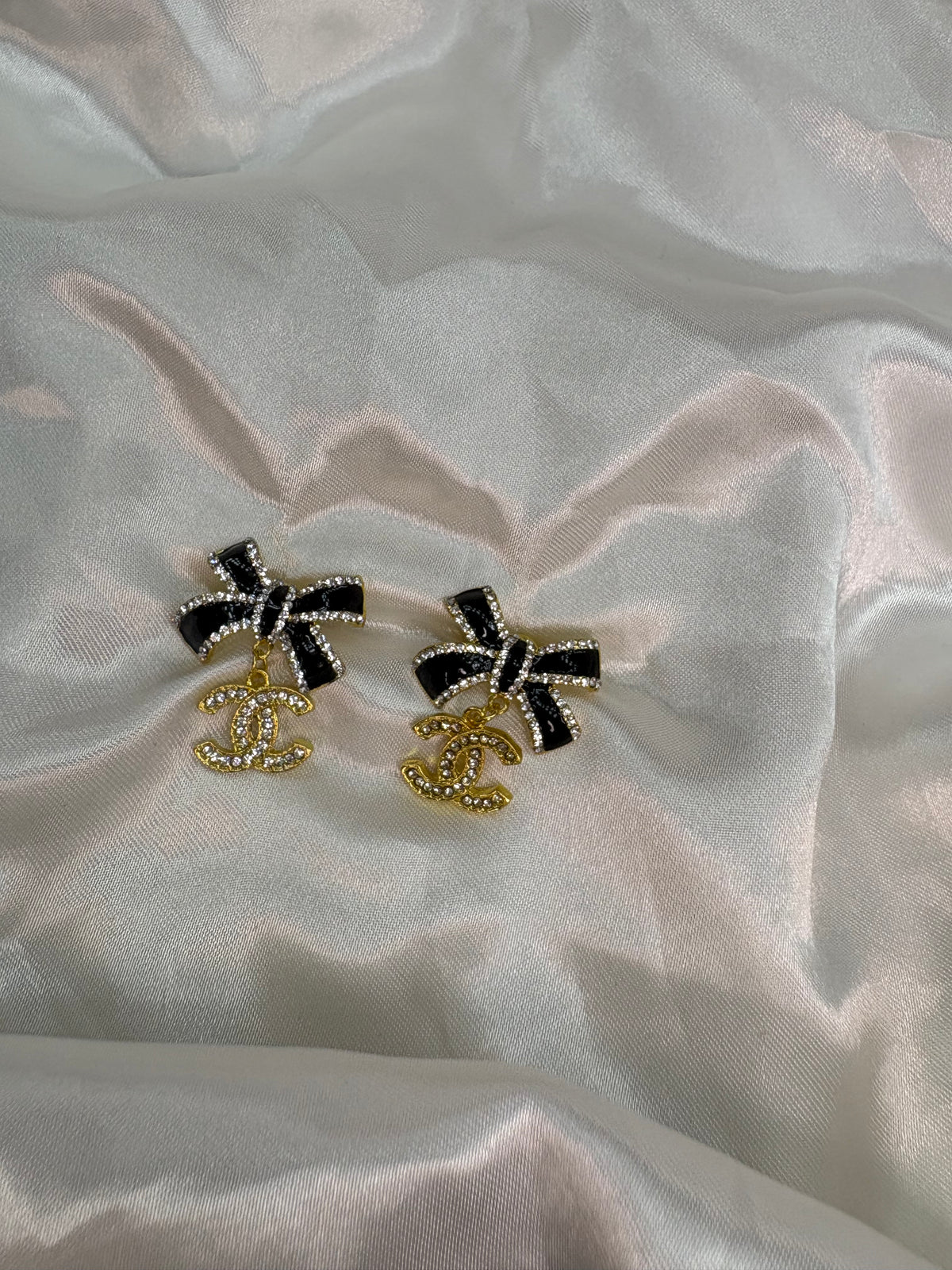 Gold black bow diamanté cece earrings