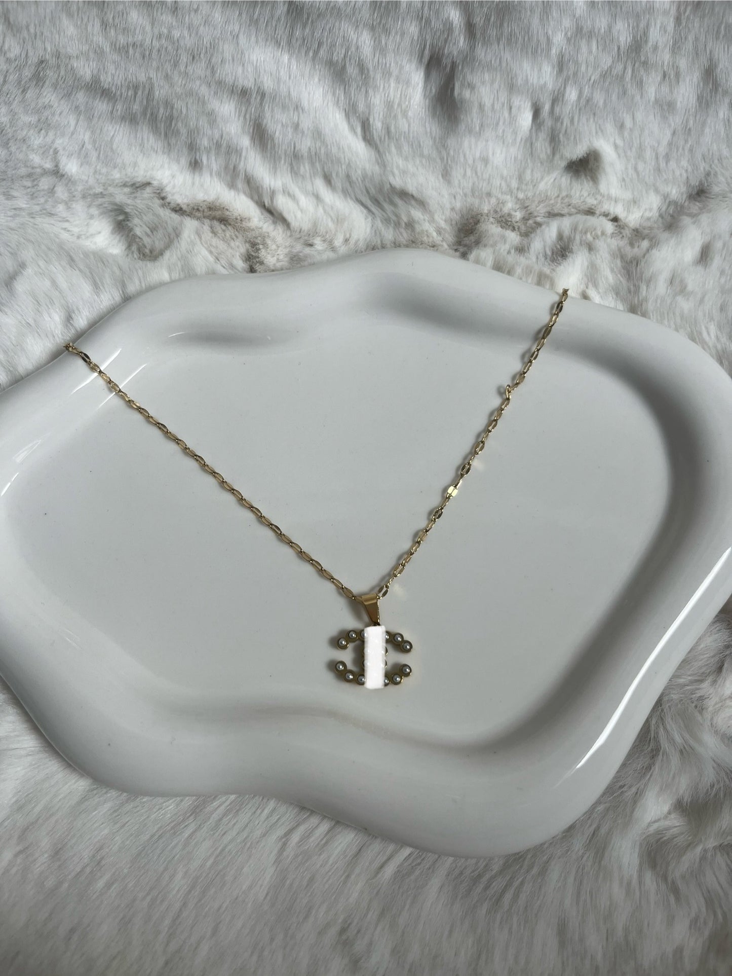 Gold Pearl Cc necklace