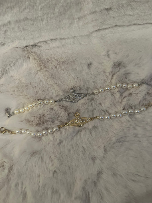 Gold or silver pearl diamanté planet bracelet