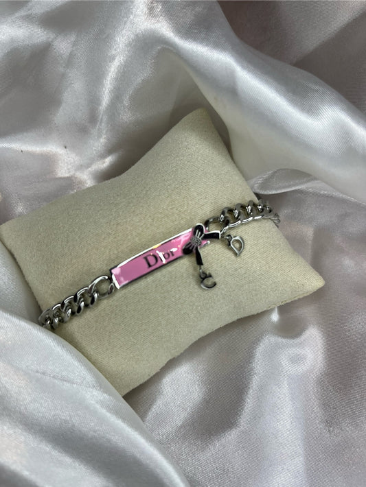 Silver chain pink bow DD bracelet