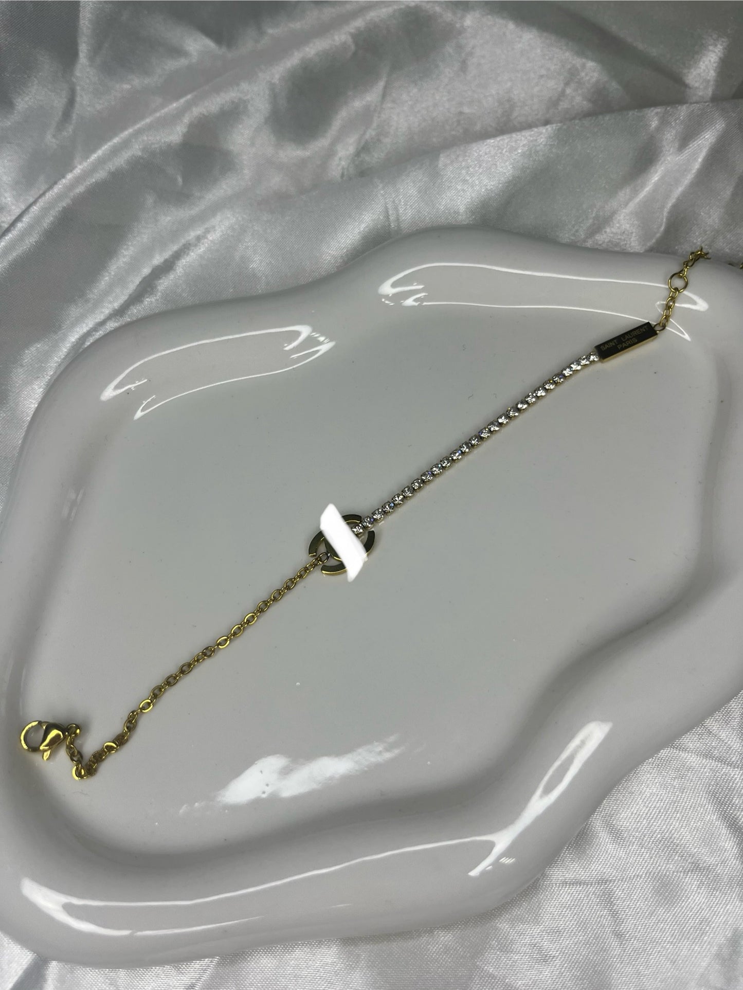 Gold cece half diamanté tennis bracelet