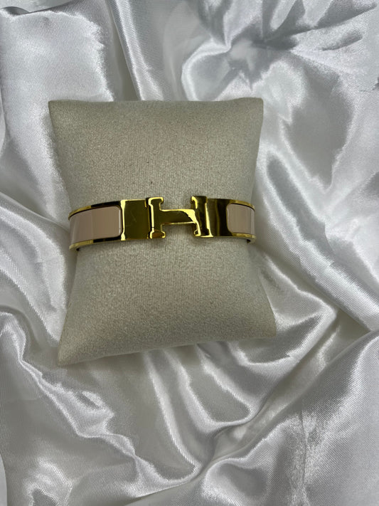 Gold nude letter H bangle