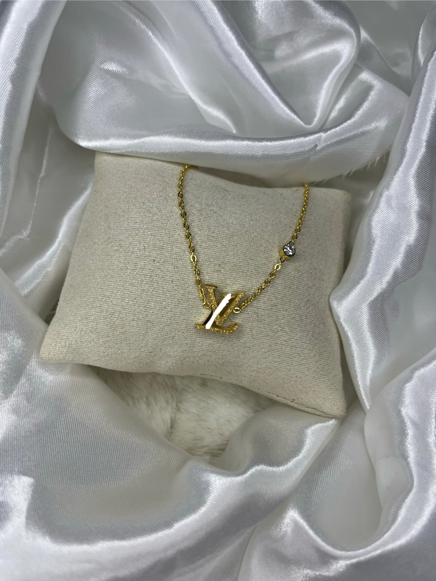 Gold glittery diamond luvu necklace