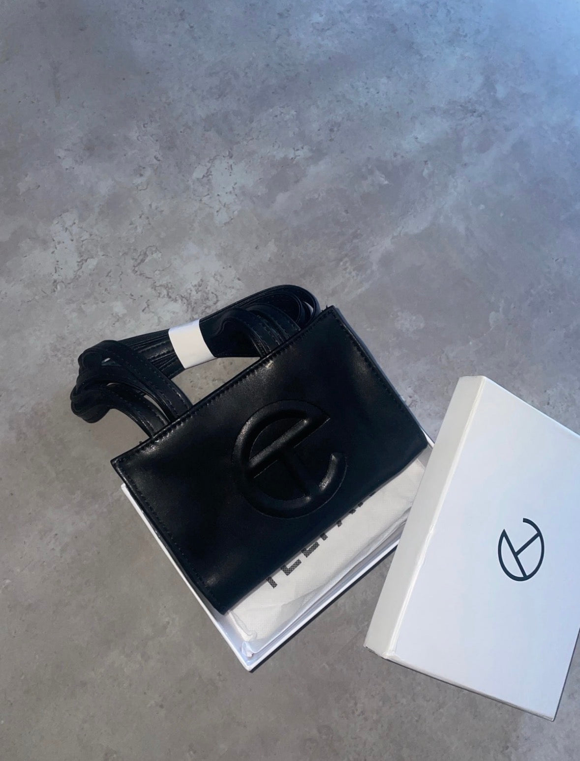 Black tel cross body bag