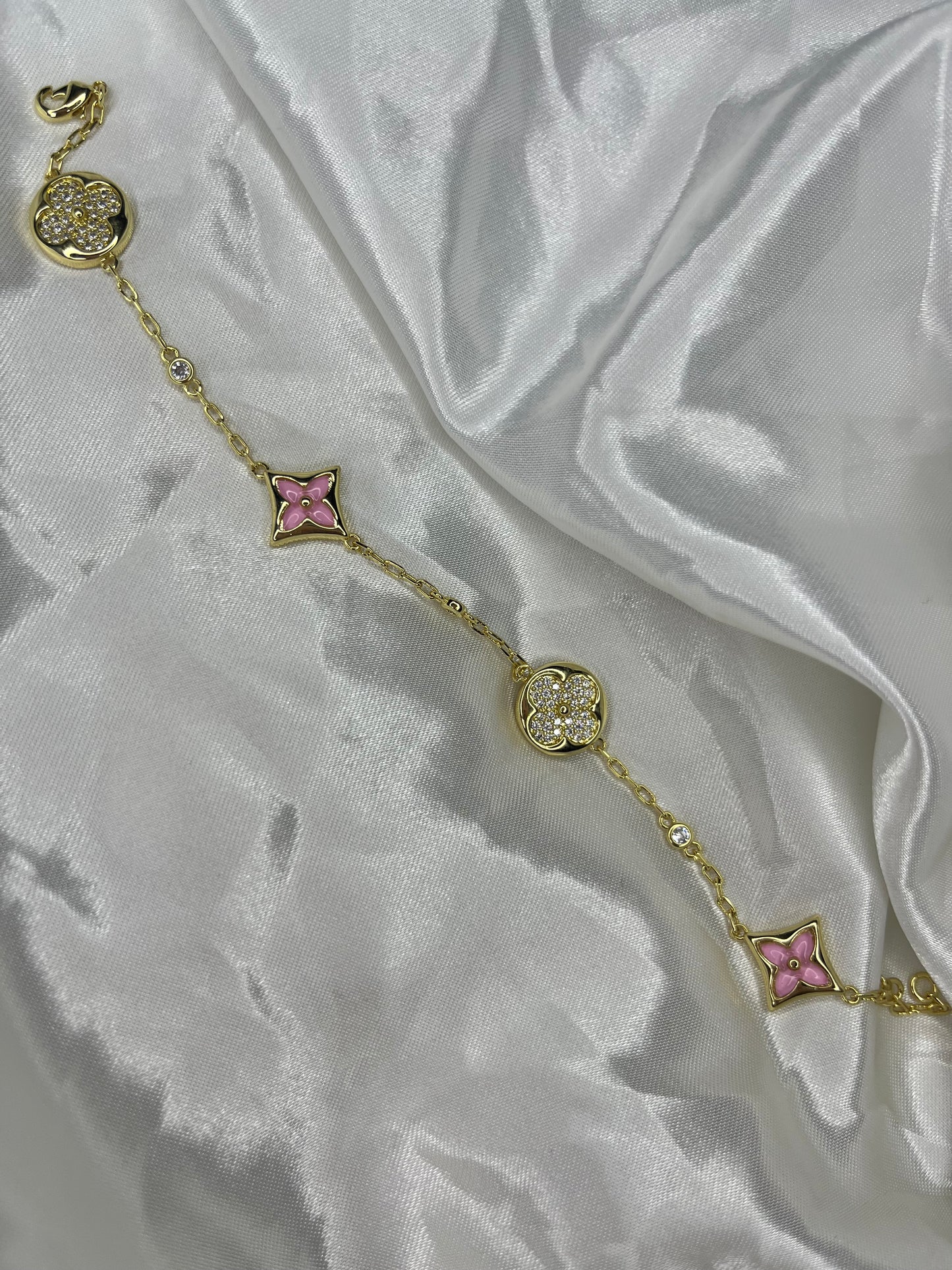Gold pink diamanté clover bracelet