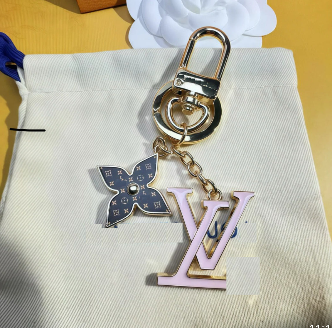 Gold pink brown luvu keychain