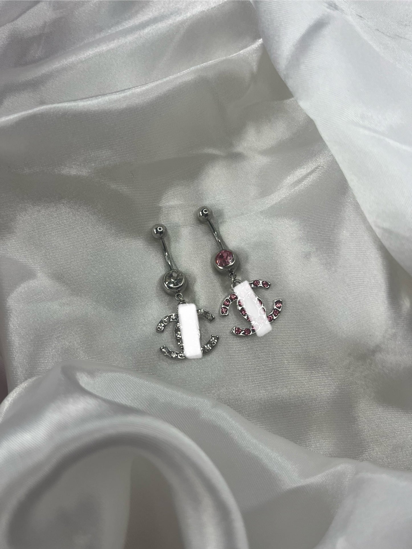 Silver diamanté pink or silver cece belly bar