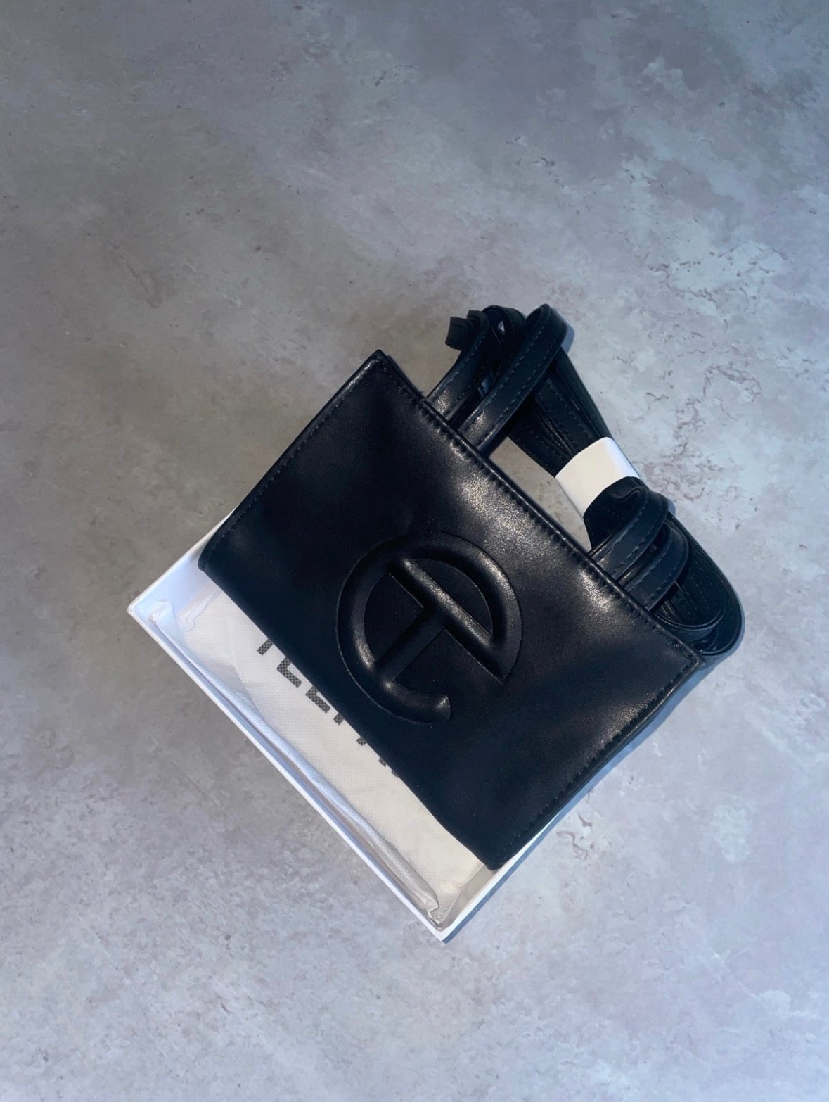 Black tel cross body bag