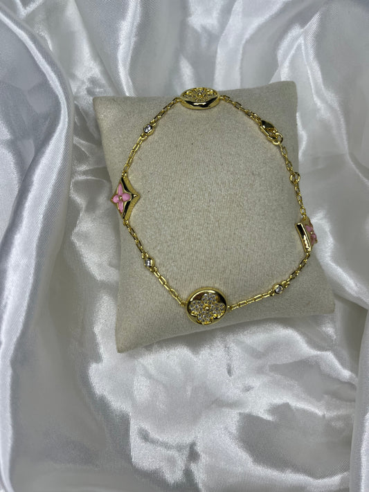Gold pink diamanté clover bracelet