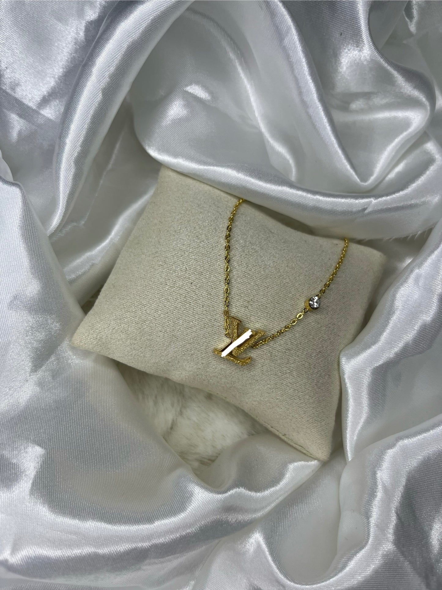 Gold glittery diamond luvu necklace