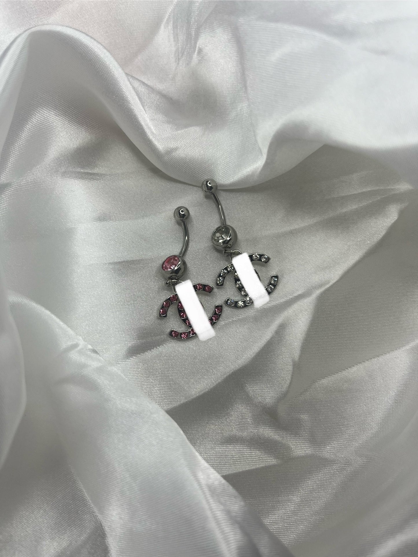 Silver diamanté pink or silver cece belly bar