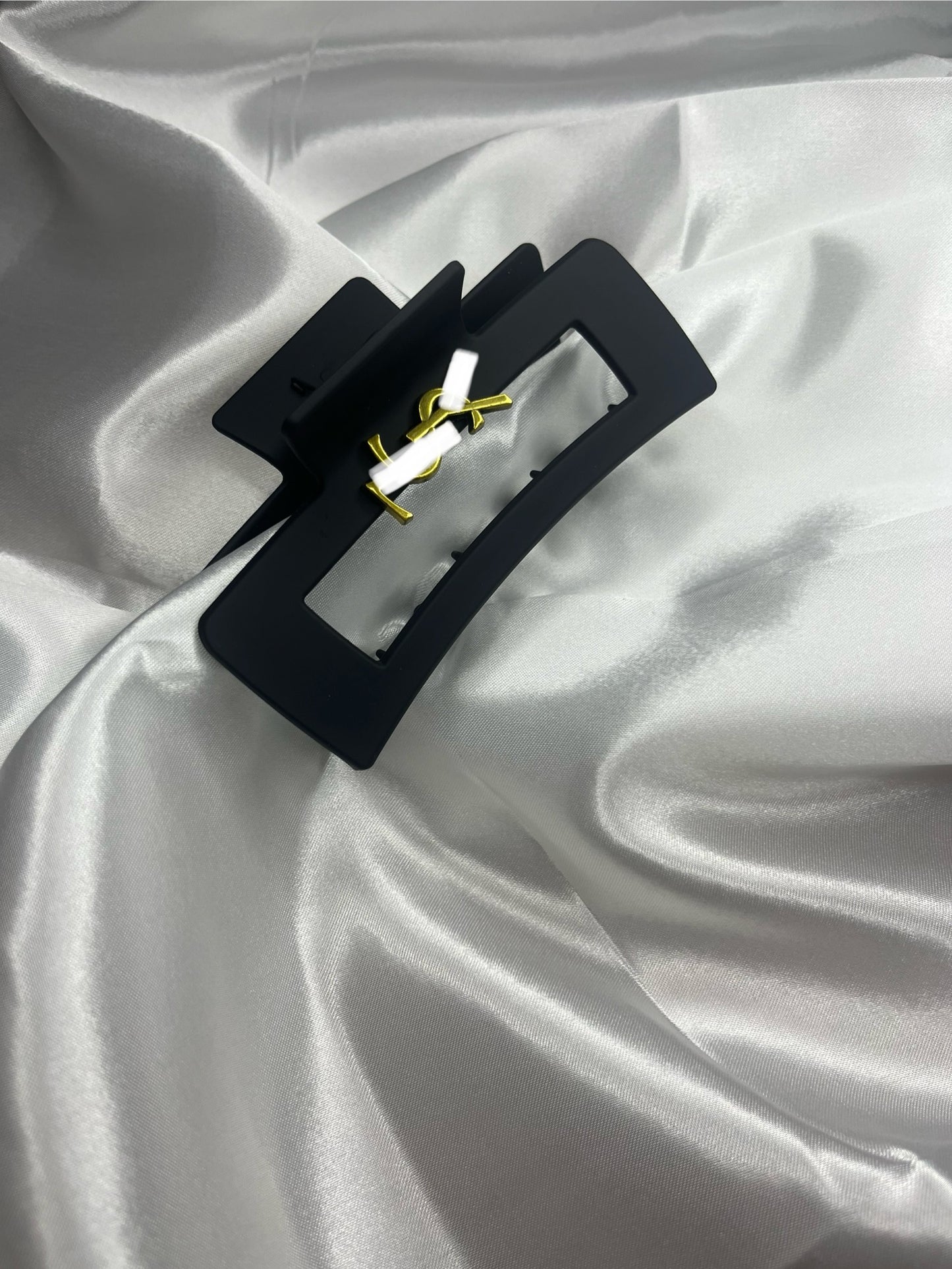 Gold black claw clip