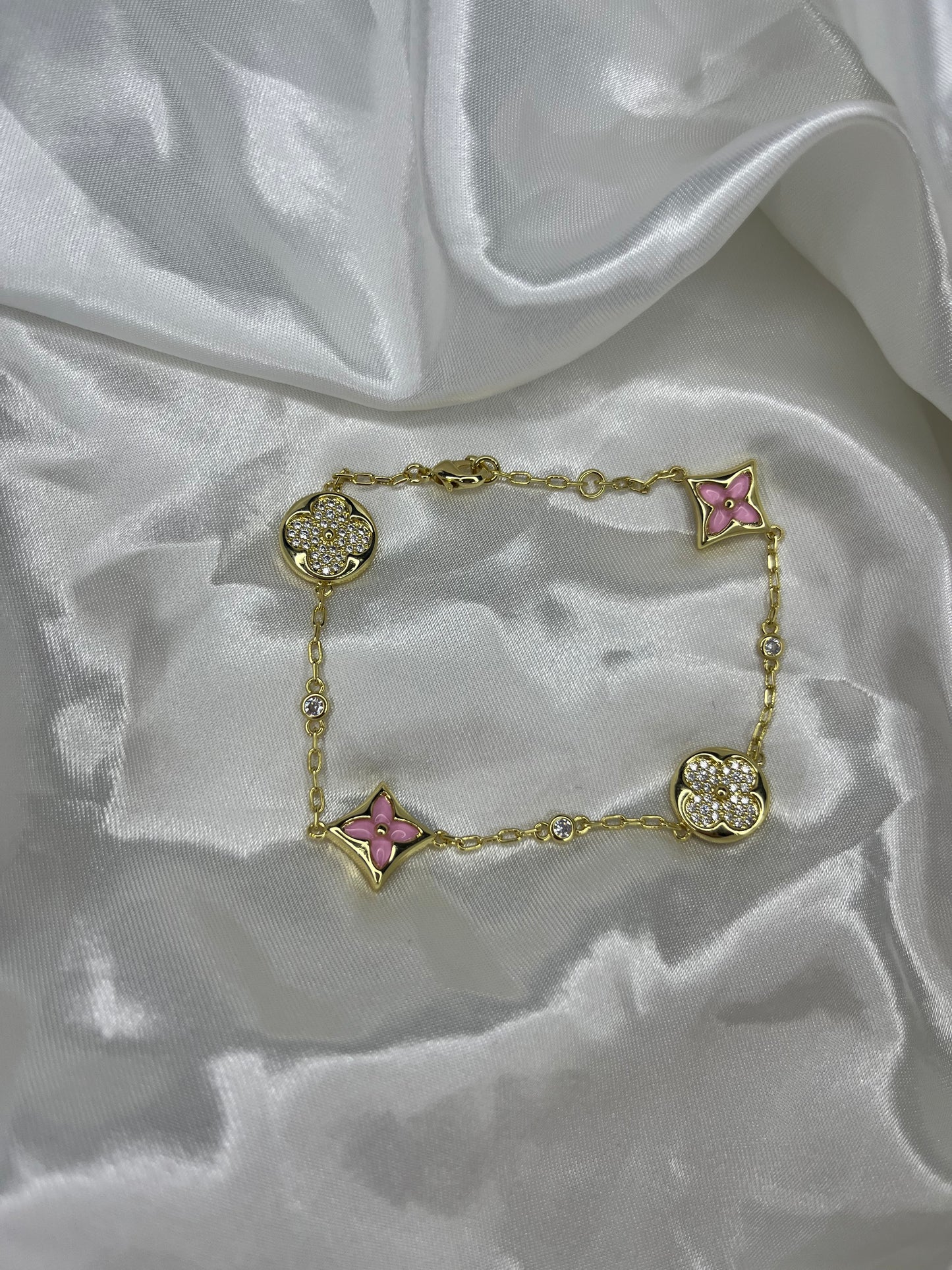 Gold pink diamanté clover bracelet