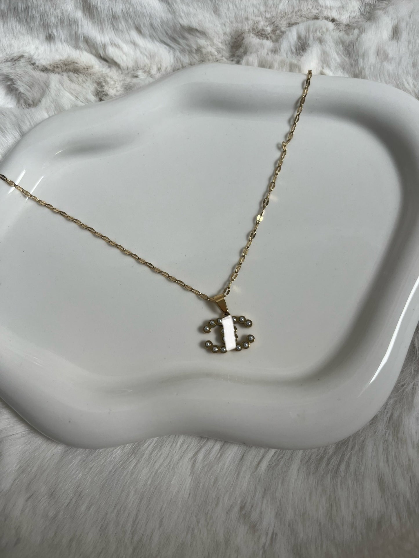 Gold Pearl Cc necklace