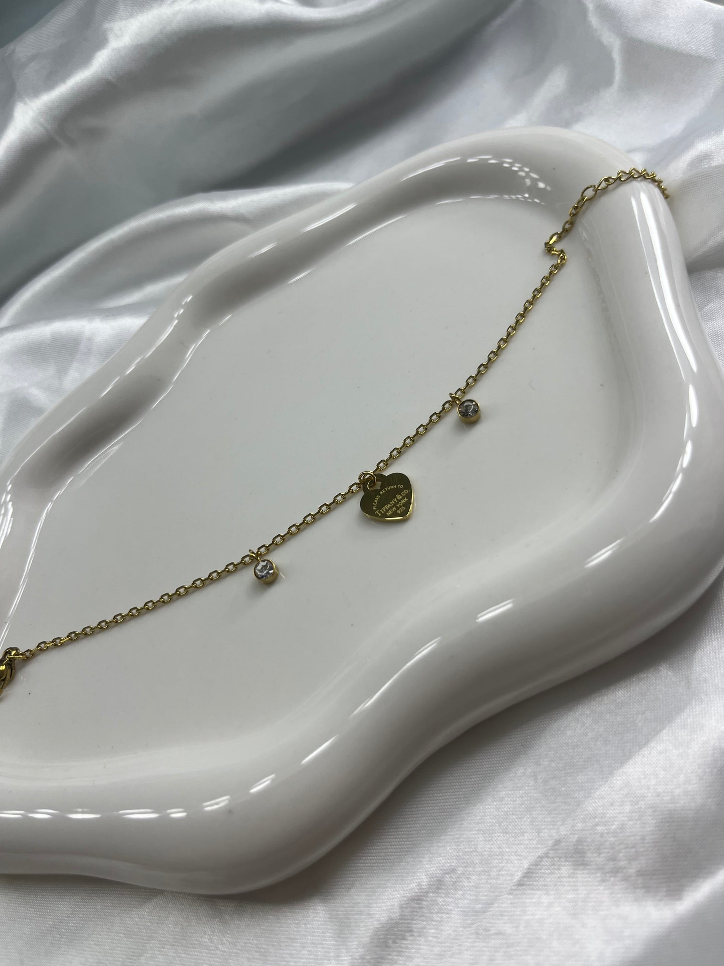Dainty gold heart tiff diamond bracelet