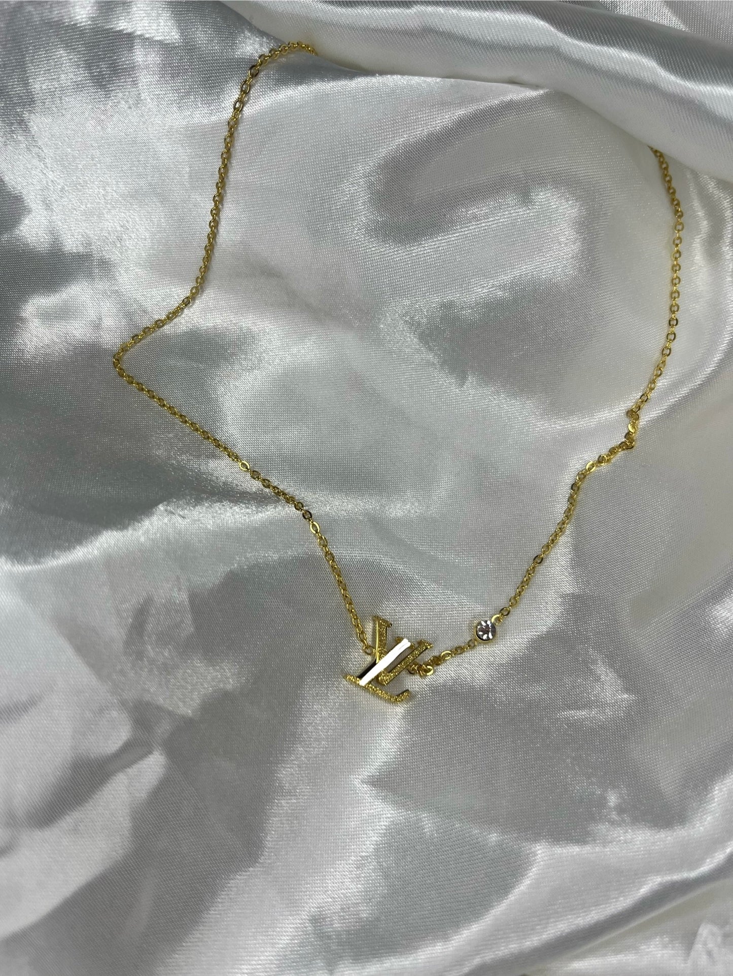 Gold glittery diamond luvu necklace