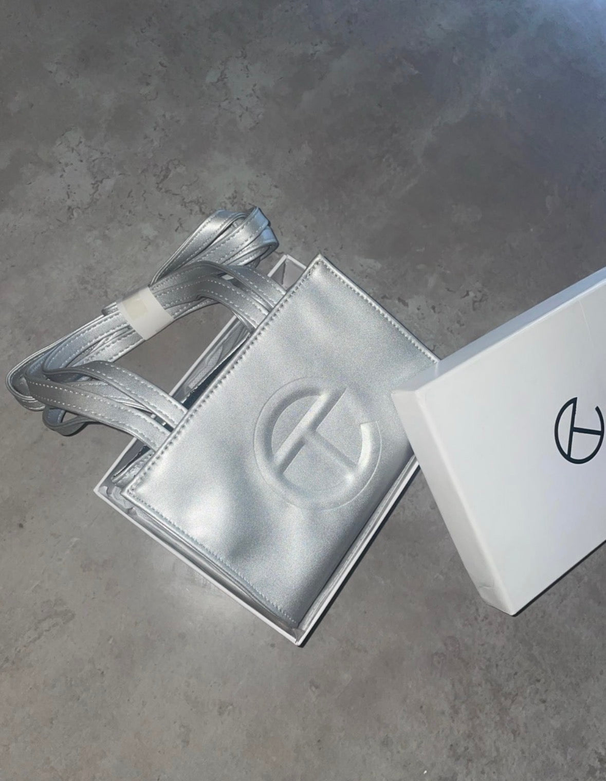 Silver tel crossbody bag
