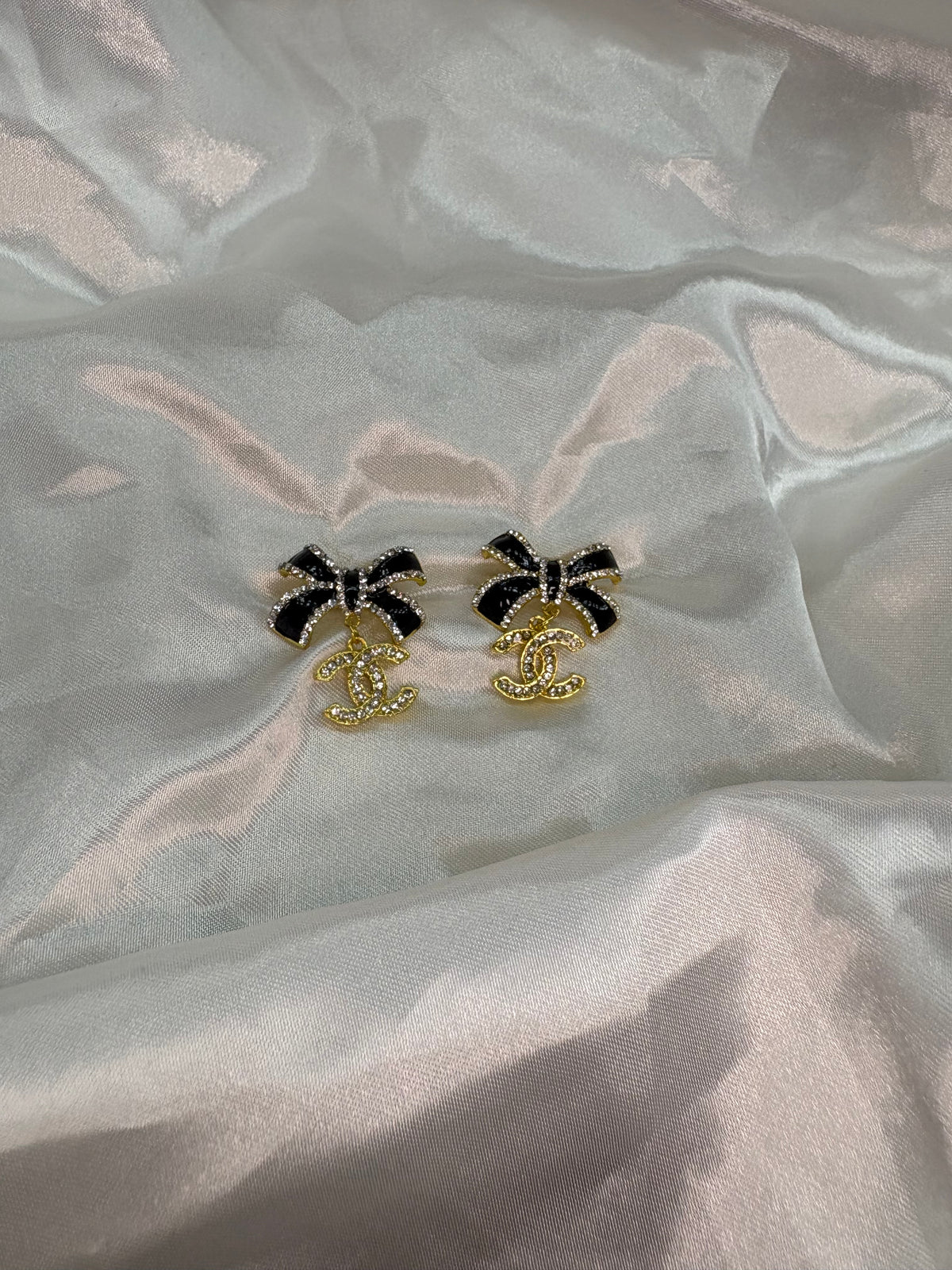 Gold black bow diamanté cece earrings