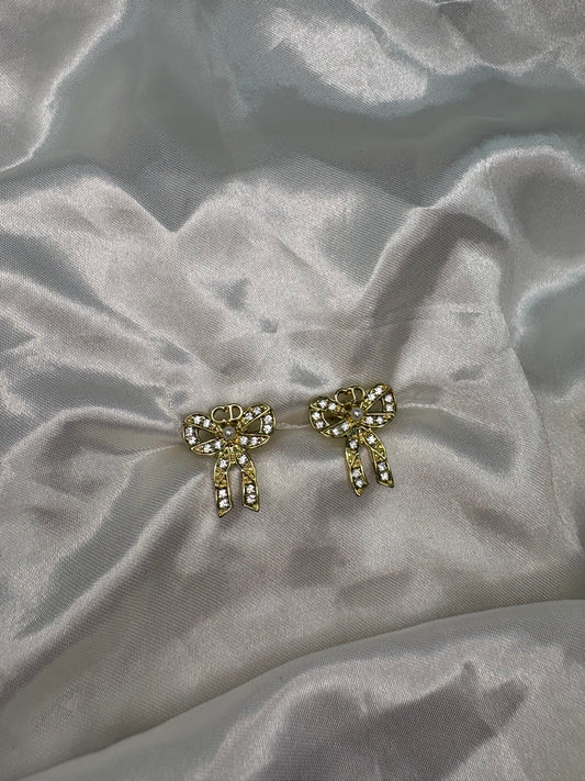 Gold diamanté DD bow earrings